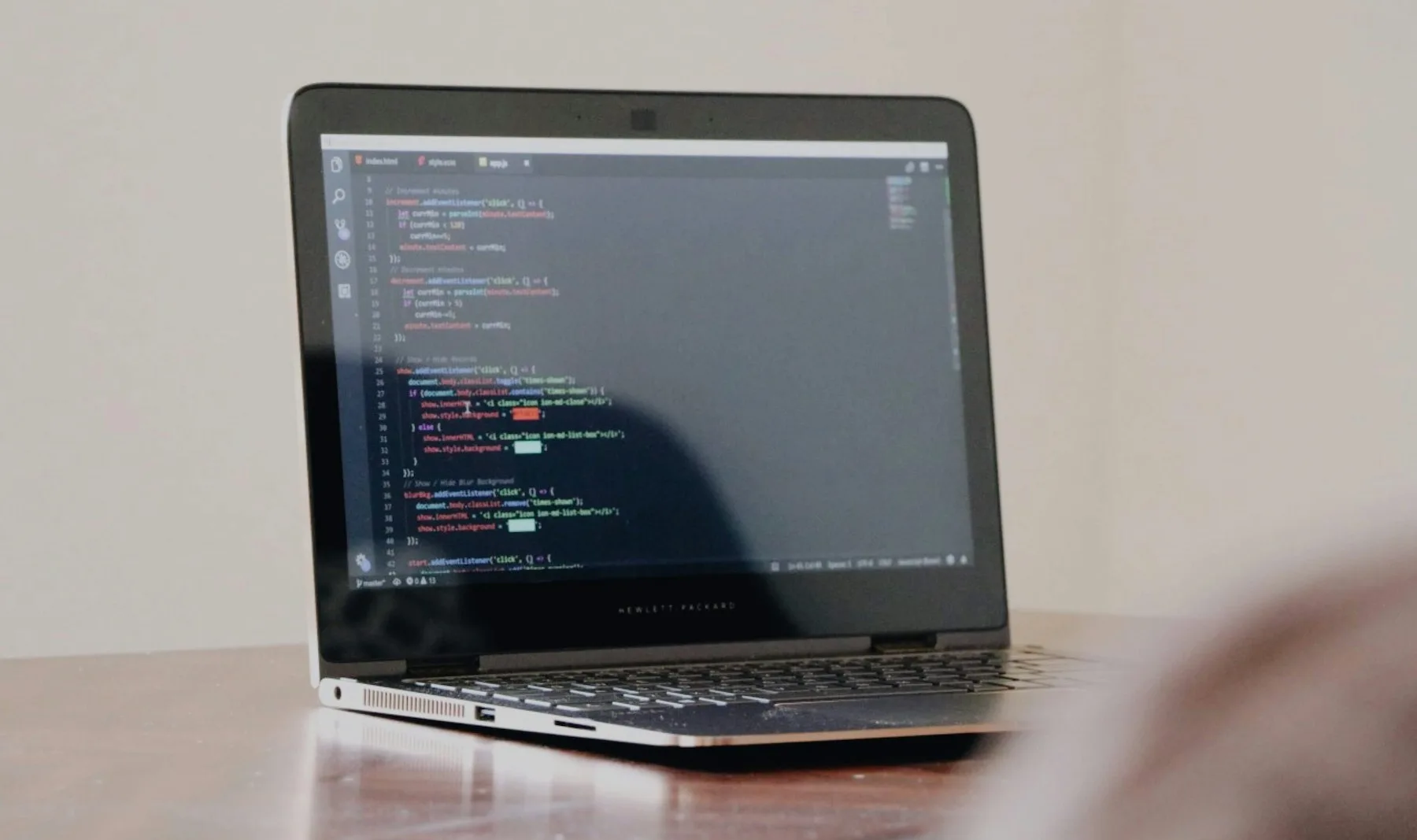 Application code displayed on a laptop