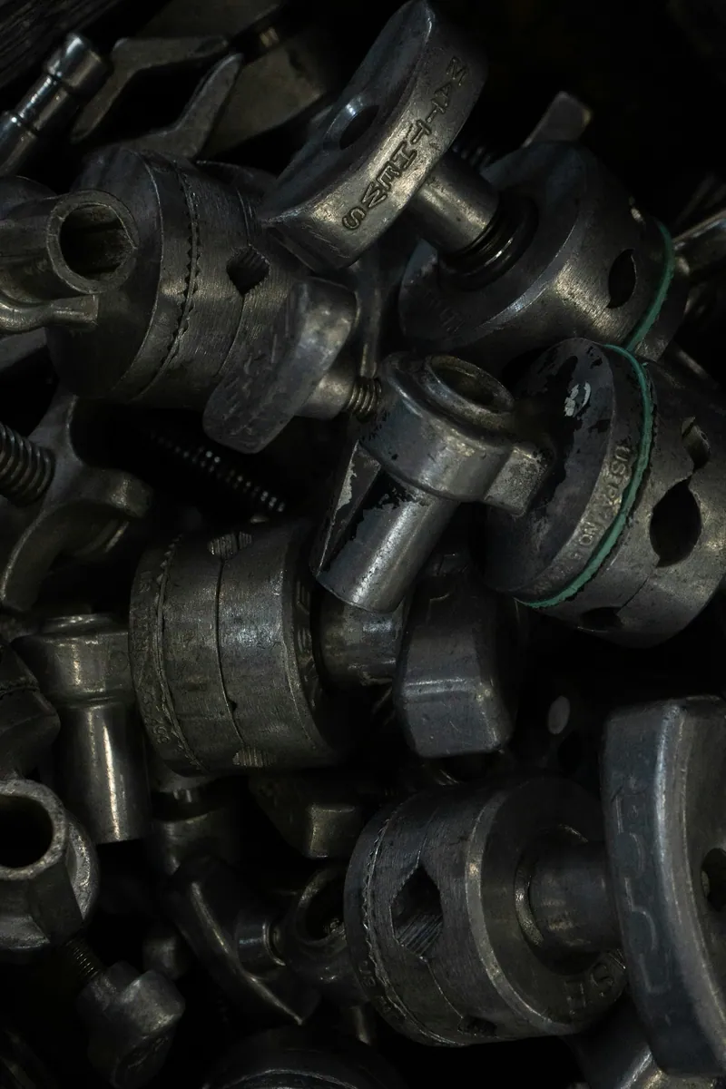 A close view of stacked metal components and fittings